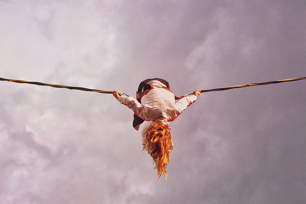 personal branding activities, image of a woman on a tightrope