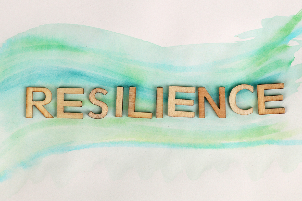 getting to resilience, image of the word "resilience" in letters on water color paper