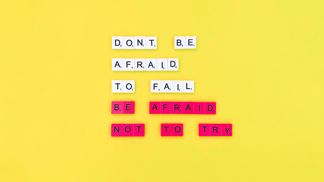 Trying and Failing: A New Perspective for a Recovering Perfectionist, image of tiles saying dont be afraid to fail, be afraid of not trying.