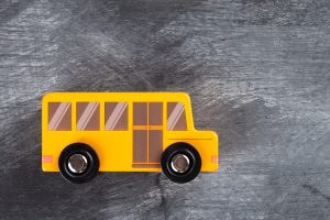 Keeping the Wheels on the Bus: Leading in Uncertain Times, image of a bus on a chalkboard.