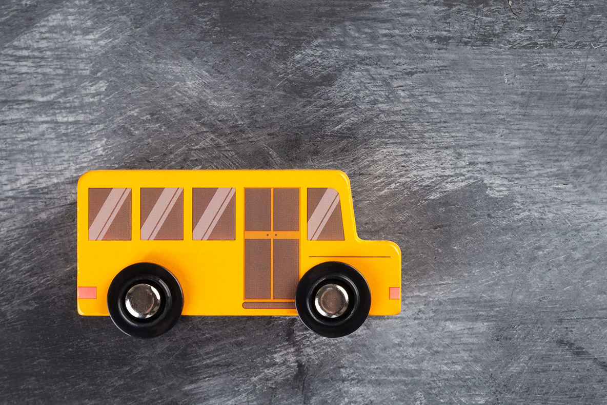 Keeping the Wheels on the Bus: Leading in Uncertain Times, image of a bus on a chalkboard.